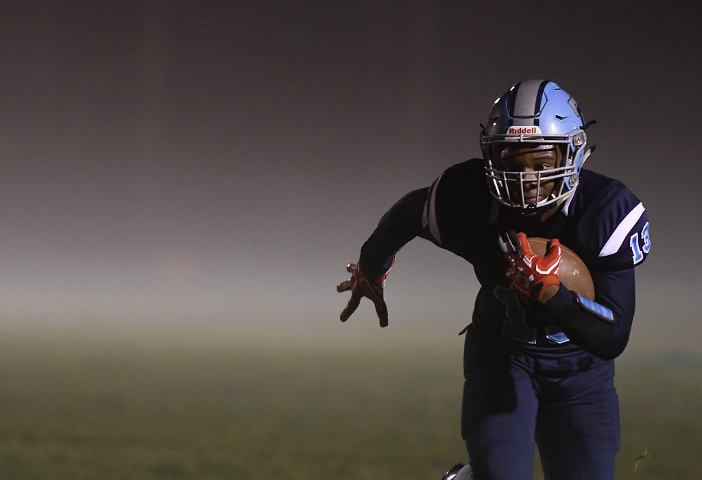 CJ Campbell, a wide receiver for Fr. Tolton Regional Catholic High School, sprints downfield
